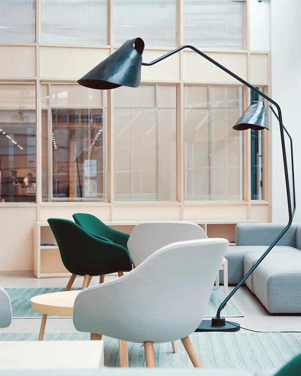 Collected living room with gallery artwork and sculptural lighting